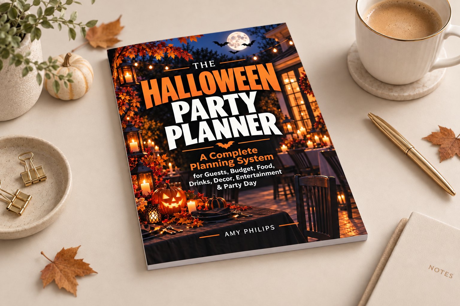 The Halloween Party Planner paperback on a desk